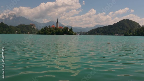 Stunning summer landscape of Lake Bled with The Assumption of Mary Church and Bled Castle