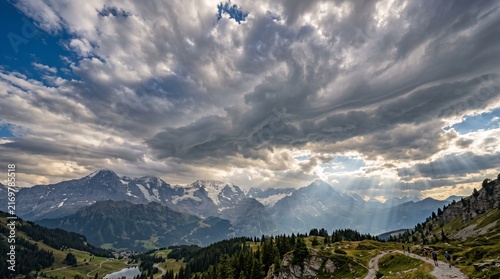Photography Dramatic storm clouds over rural landscape, dark thunderhead sky with heavy rain