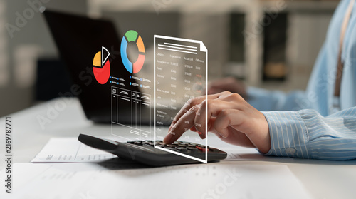 Canvastavla Businesswoman using a calculator with digital budget charts and financial data interface, representing expense analysis, financial planning, accounting, cost control and business management