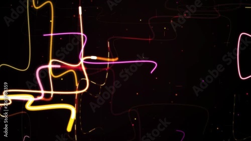 Modern abstract motion graphic of glowing neon light trails moving along circuit pathways on dark background