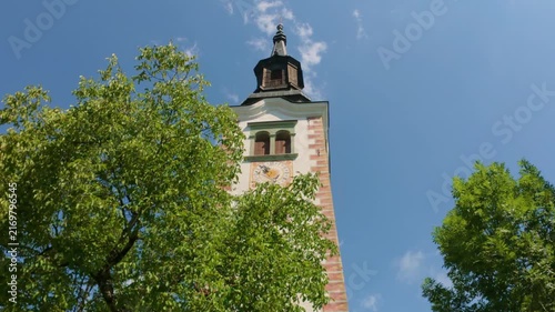 Iconic bell tower of the Pilgrimage Church of the Assumption of Maria on Lake Bled, Slovenia
