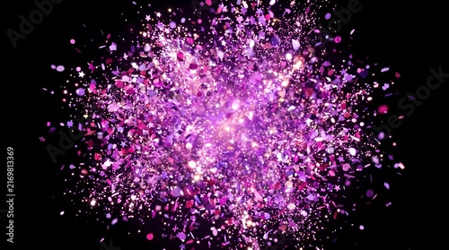 A vibrant explosion of shimmering purple and pink glitter particles against a dark black background, creating a dazzling abstract light effect.