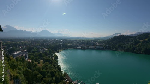 Breathtaking high angle view of Lake Bled, Slovenia, with mountains on a sunny day