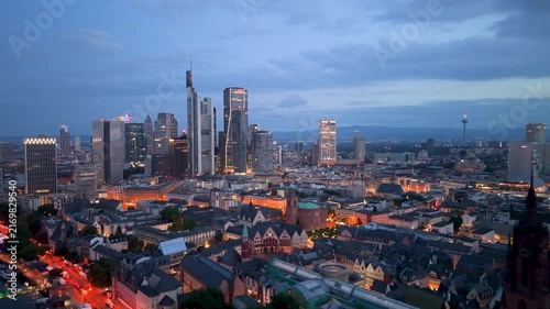 Erial Urban skyline at dusk with buildings and river in city of Frankfurt, Germany