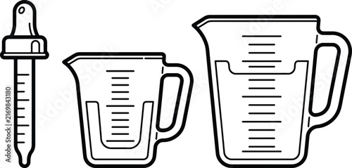 Kitchen measuring tools featuring two graduated jugs and a liquid dropper for precise culinary preparation and baking recipes requiring accurate fluid volumes when mixing ingredients in home