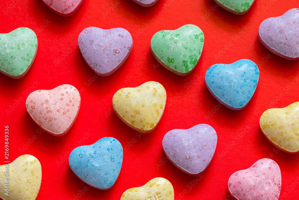 Obraz premium Colorful heart shaped candies background texture for Valentine day