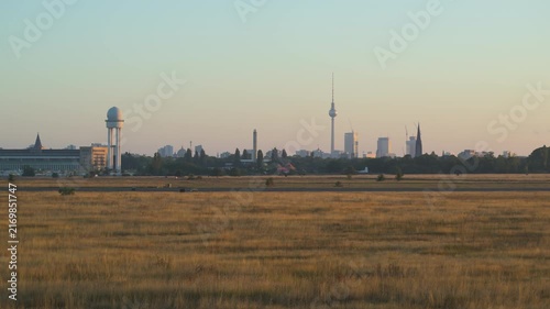 skyline of Berlin downtown from Tempelhofer Feld at sunrise 4K