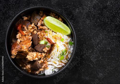 Rice Vermicelli with Northern Thai Curry Sauce (Khanom Chin Nam Ngiao) is a local dish from Northern Thailand.