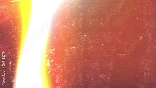 Animated fast light leak transition with bright yellow flash, intense orange film burn, and heavy dust particles for 4K video overlays.