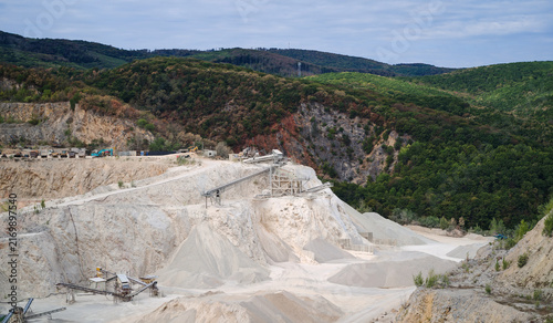 Photography Limestone processing and conveyor equipment surrounded by crushed rock at the Mexiko Valley quarry in Miskolc, Northern Hungary