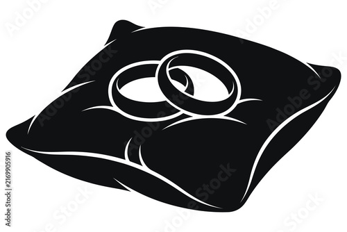 Wedding rings resting on a satin cushion during a ceremony vector silhouette