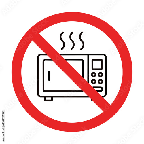 Prohibition sign with a microwave oven icon inside a red circle with a diagonal slash isolated on white background minimalist safety symbol concept