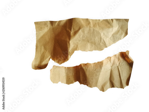 Two pieces of torn brown craft paper with rough texture and edges