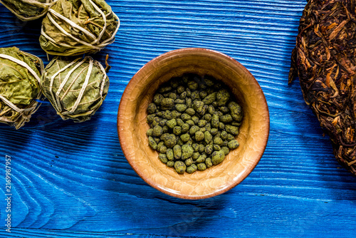 Canvas Print Drink herbal tea with brew blue wooden table background top view