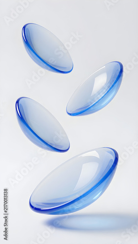 Transparent blue plastic discs and curved glass shapes float on a light background in a minimalist futuristic design.