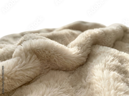 Close up view of a soft and fluffy cream colored faux fur blanket with deep folds and shadows creating a cozy and comfortable texture on white background isolated on a transparent background