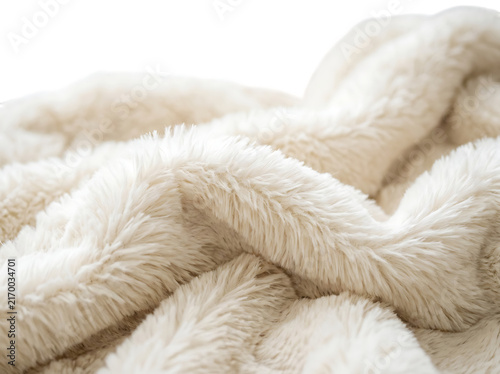 Close up of soft and fluffy faux fur fabric in a creamy beige color with deep folds and textures creating a cozy and warm aesthetic for home decor isolated on a transparent background