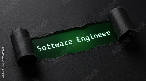 Software Engineer Text Revealed Under Torn Black Paper Background