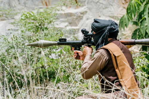 Canvastavla Intense outdoor scene featuring soldiers on duty in jungle with heavy weaponry a