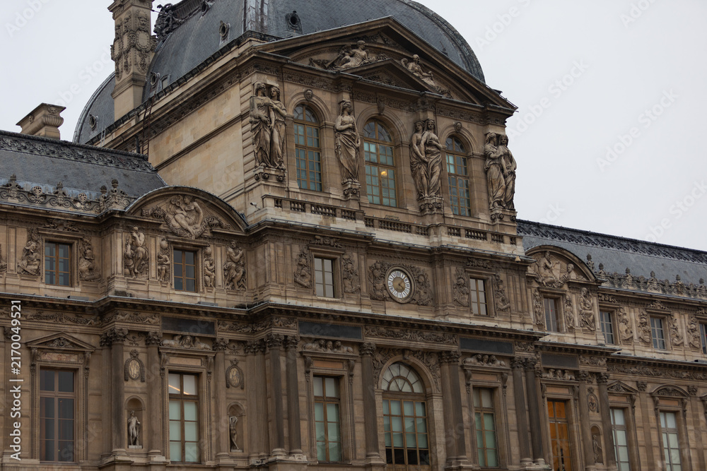 Obraz premium Ornate Pavillon de l’Horloge Facade at the Louvre Museum