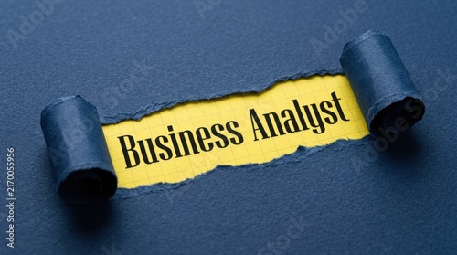Business Analyst Text Revealed Under Torn Blue Paper Background