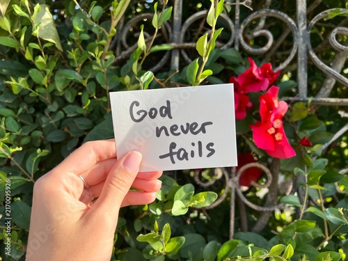 God never fails - hand with christian motivational concept
