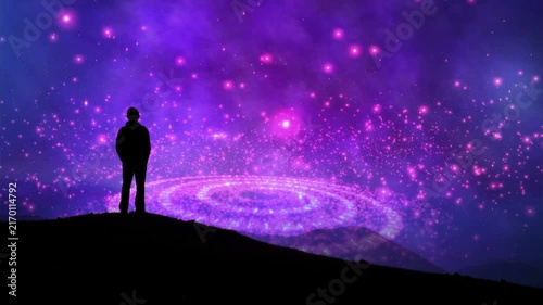 Silhouette of a Man Stargazing at a Glowing Purple Galaxy