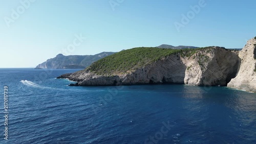 4K Aerial static view of Chomi Beach and surrounding coastline near Paleokastritsa, Greece