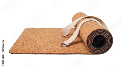 Eco-friendly cork yoga mat with cotton carrying strap, sustainable fitness equipment for pilates and meditation, natural wood texture exercise mat isolated PNG with Transparent Background