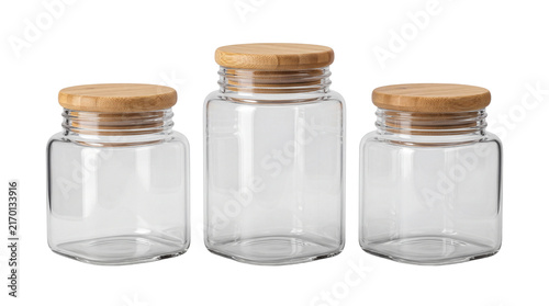 Minimalist glass jars with bamboo lids, set of three empty kitchen storage canisters, eco-friendly glass containers for pantry organization isolated PNG with Transparent Background