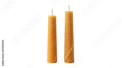 Natural beeswax candles with honeycomb texture, handmade yellow wax taper candles, organic home decor accessories isolated PNG with Transparent Background