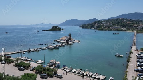 1‑minute 4K timelapse of planespotting causeway with boat gliding past near Corfu Airport, Greece
