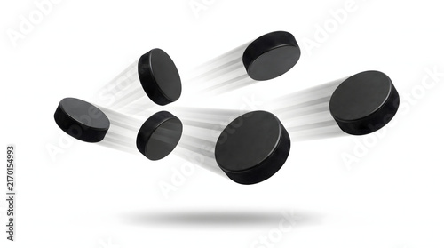 Black Hockey Pucks in Motion on White Background