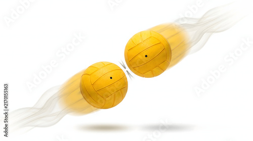 Two Yellow Volleyballs in Motion with Smoke Trail