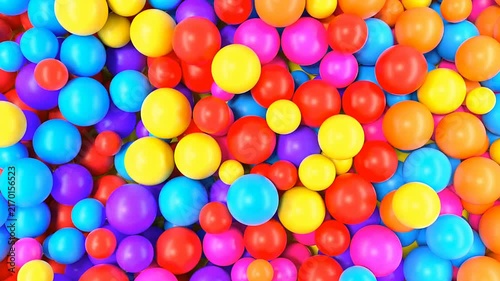 colorful 3d spheres floating against bright on background.