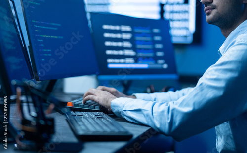 AI engineer, Professional male IT specialist working on software development, programmer typing code for data analytics, Modern technology, Tech Startups, developer and computer programming concept