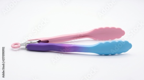 Pastel Silicone Kitchen Tongs in Pink and Blue.