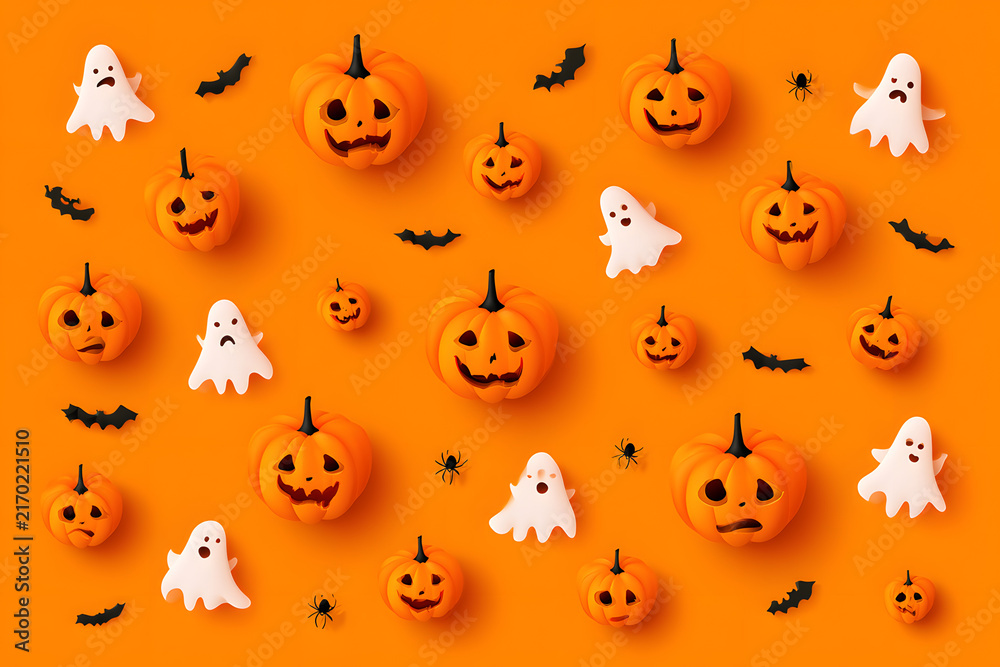 Obraz premium A flat lay Halloween greeting card featuring orange pumpkins, bats, spiders, and ghosts on an eerie background.