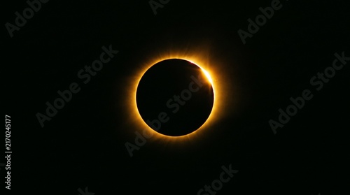 Stunning Total Solar Eclipse with a Brilliant Golden Corona Glowing Against the Dark Void of Outer Space