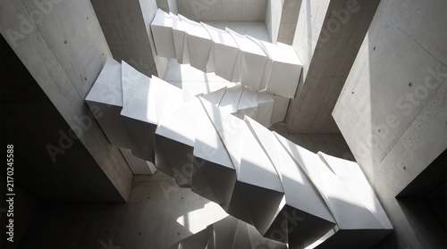 Geometric concrete architecture with modern floating stairs and dramatic natural light casting sharp shadows inside a minimalist interior design