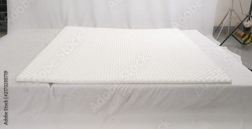 Cuadro en lienzo Close-up of white convoluted egg crate foam topper layer for mattress, bedding m