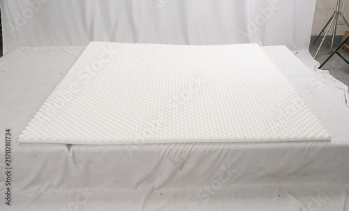 Obraz na plátně Close-up of white convoluted egg crate foam topper layer for mattress, bedding m