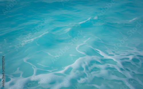 Clear turquoise ocean water vector illustration with gentle waves sunlight reflections and natural foam texture for marine designs