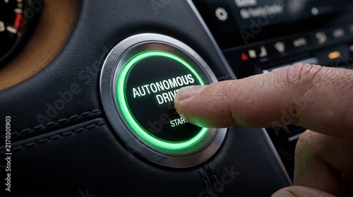 Autonomous Drive Button Activated: A finger presses a glowing green button labeled Autonomous Drive on a car's dashboard, symbolizing the future of automotive technology and self-driving innovation.