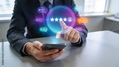 Businessman Using Smartphone with Futuristic Five Star Customer Rating and Feedback Interface