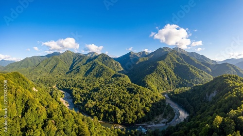 Majestic forest-covered green mountains beneath a crystal-clear blue sky, showcasing pristine air and untouched nature while symbolizing environmental conservation, clean air and a sustainable planet.