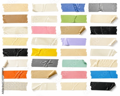 Collection of colorful adhesive masking tape strips on white background