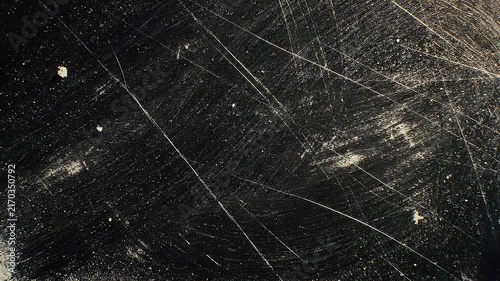 Abstract black textured background with scratches dust and grunge effect for design
