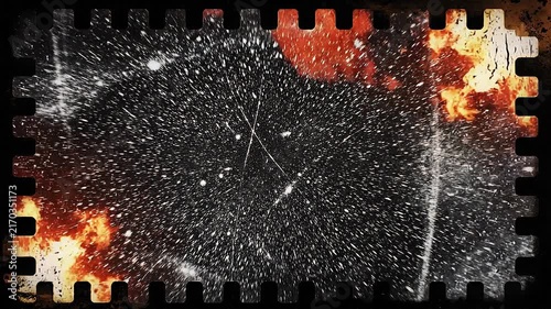 Dramatic fire explosion with bright orange flames and sparks captured in dark background