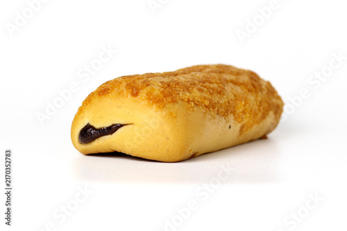 Fresh golden bread roll with a crisp crumb topping and rich chocolate filling, isolated on a clean white background